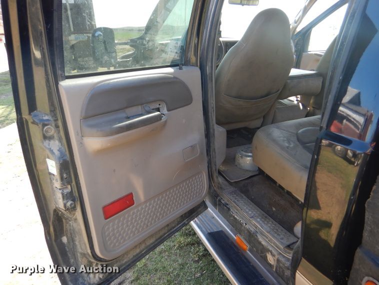 image for item DD4503 1999 Ford F350 Super Duty Crew Cab flatbed pickup truck