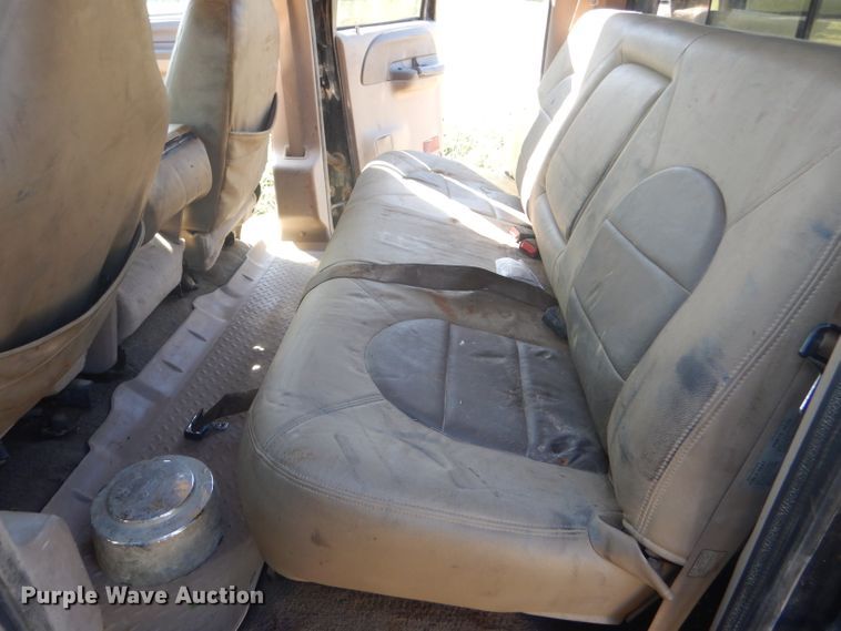 image for item DD4503 1999 Ford F350 Super Duty Crew Cab flatbed pickup truck