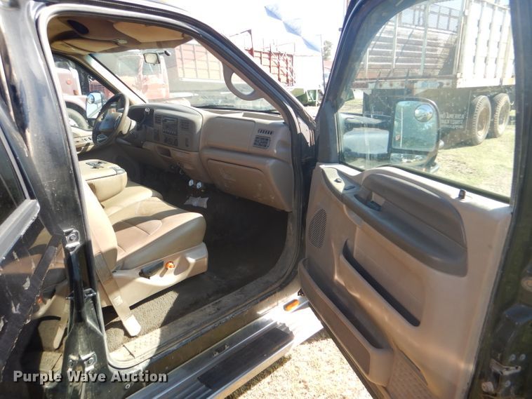 image for item DD4503 1999 Ford F350 Super Duty Crew Cab flatbed pickup truck