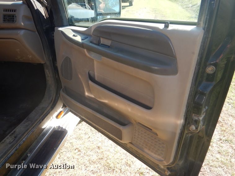 image for item DD4503 1999 Ford F350 Super Duty Crew Cab flatbed pickup truck