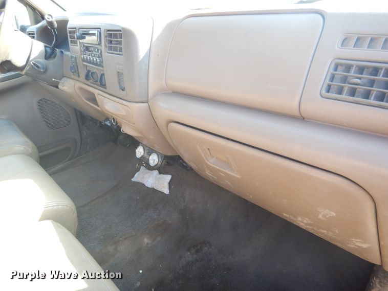 image for item DD4503 1999 Ford F350 Super Duty Crew Cab flatbed pickup truck