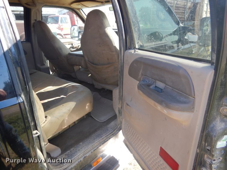 image for item DD4503 1999 Ford F350 Super Duty Crew Cab flatbed pickup truck