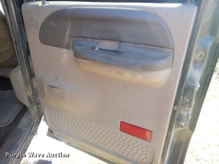 image for item DD4503 1999 Ford F350 Super Duty Crew Cab flatbed pickup truck