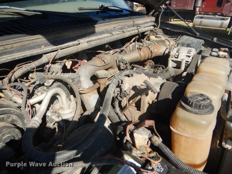 image for item DD4503 1999 Ford F350 Super Duty Crew Cab flatbed pickup truck