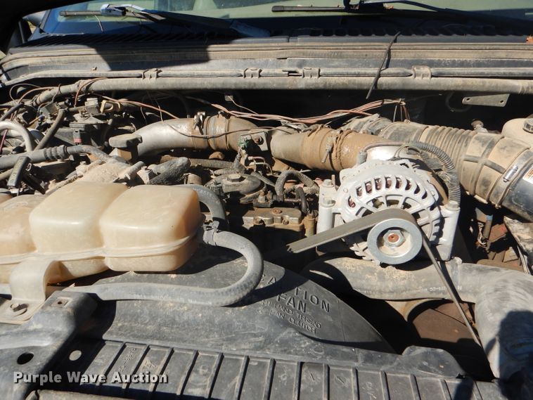 image for item DD4503 1999 Ford F350 Super Duty Crew Cab flatbed pickup truck