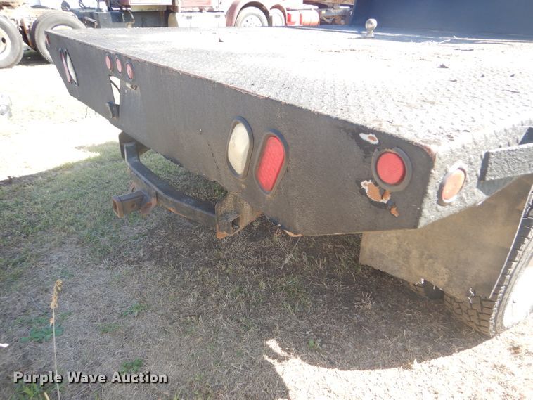 image for item DD4503 1999 Ford F350 Super Duty Crew Cab flatbed pickup truck