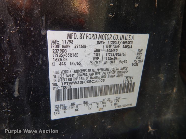 image for item DD4503 1999 Ford F350 Super Duty Crew Cab flatbed pickup truck