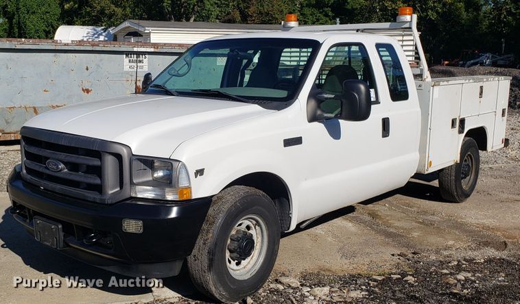 image for item DG7565 2002 Ford F250 Super Duty SuperCab utility bed pickup truck