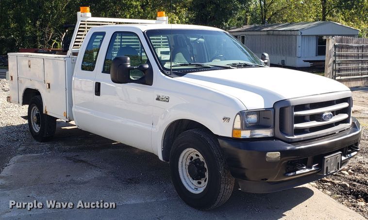 image for item DG7565 2002 Ford F250 Super Duty SuperCab utility bed pickup truck