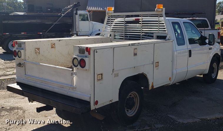 image for item DG7565 2002 Ford F250 Super Duty SuperCab utility bed pickup truck