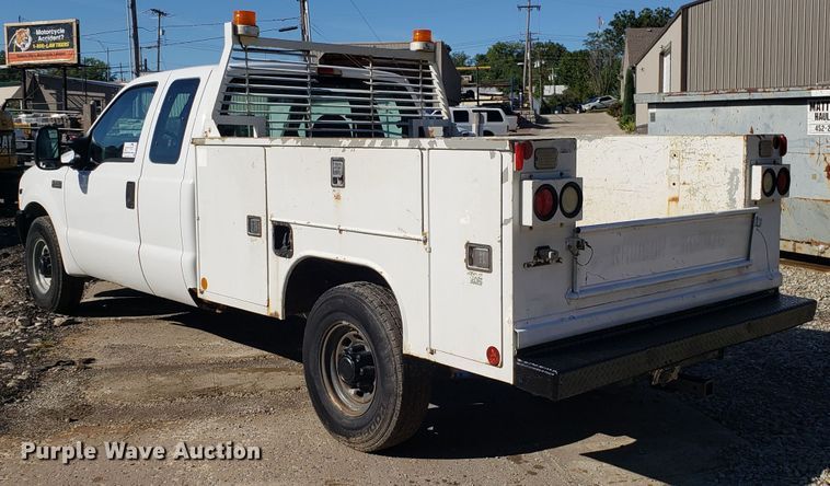 image for item DG7565 2002 Ford F250 Super Duty SuperCab utility bed pickup truck