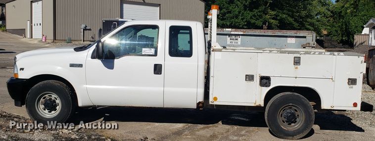 image for item DG7565 2002 Ford F250 Super Duty SuperCab utility bed pickup truck