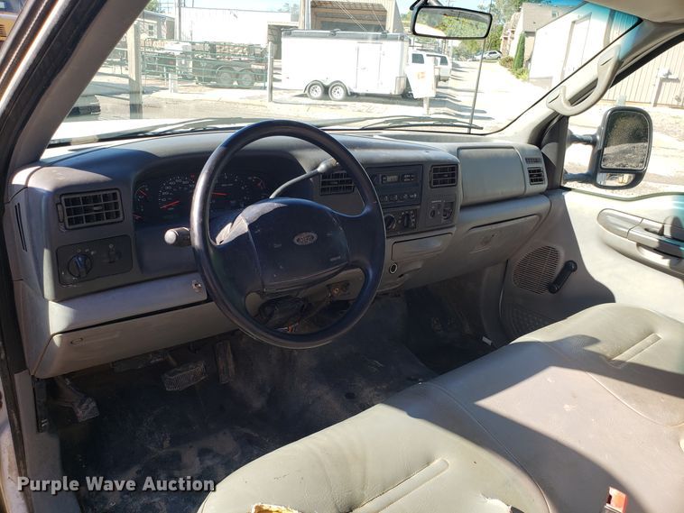 image for item DG7565 2002 Ford F250 Super Duty SuperCab utility bed pickup truck