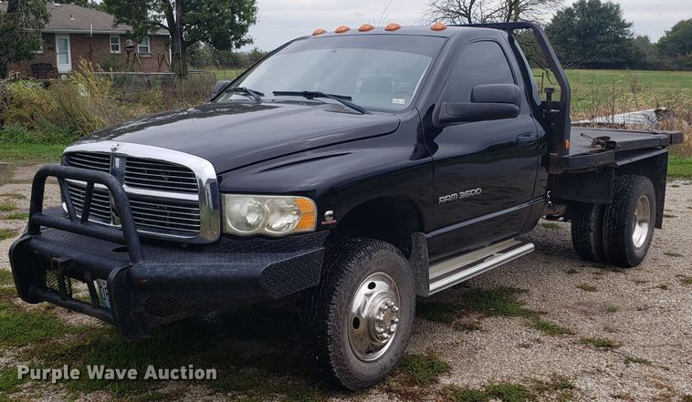 image for item DG8756 2003 Dodge Ram 3500 bale bed pickup truck