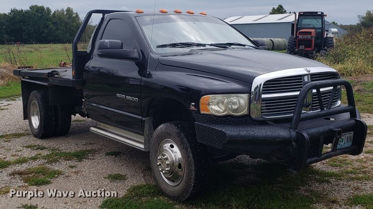 image for item DG8756 2003 Dodge Ram 3500 bale bed pickup truck