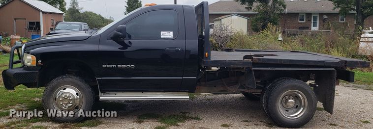 image for item DG8756 2003 Dodge Ram 3500 bale bed pickup truck