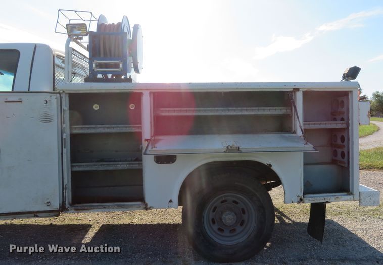 image for item DH1599 2002 Ford F350 Super Duty XL utility bed pickup truck