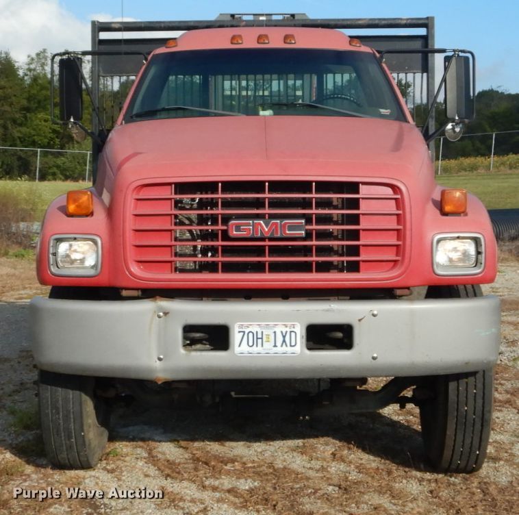 image for item DH2091 1999 GMC C6500 dump flatbed truck with Donkey forklift