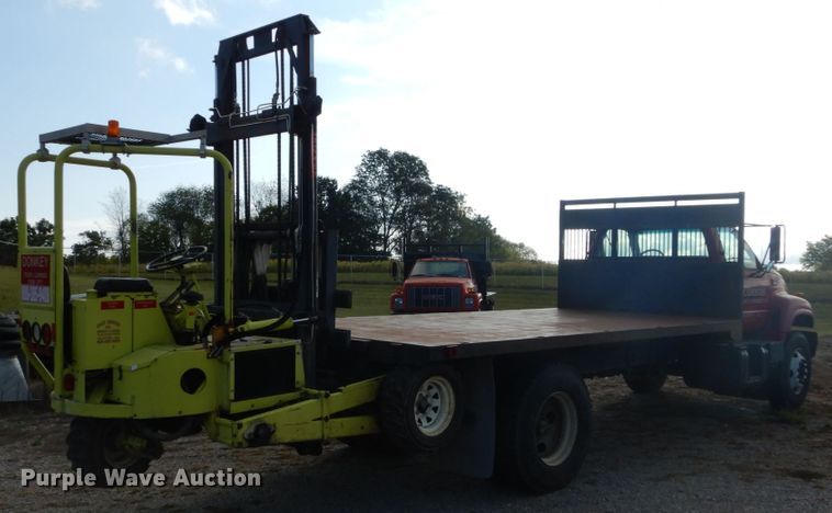 image for item DH2091 1999 GMC C6500 dump flatbed truck with Donkey forklift
