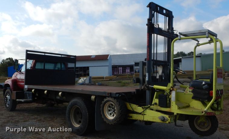 image for item DH2091 1999 GMC C6500 dump flatbed truck with Donkey forklift