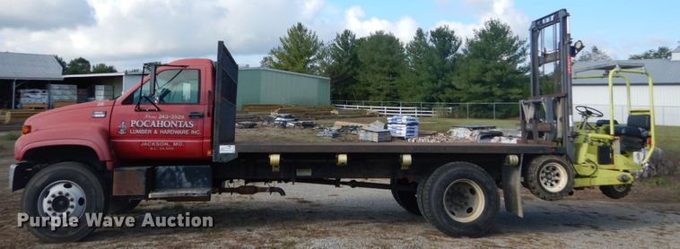 image for item DH2091 1999 GMC C6500 dump flatbed truck with Donkey forklift