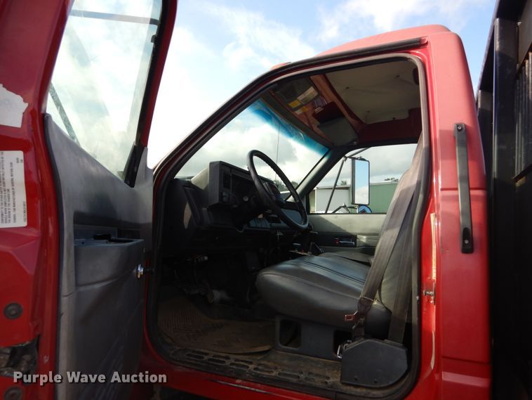 image for item DH2091 1999 GMC C6500 dump flatbed truck with Donkey forklift