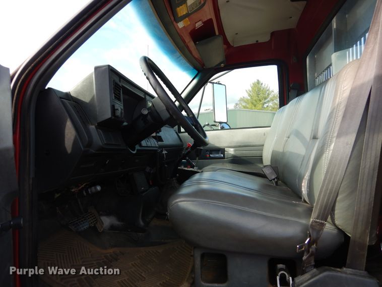 image for item DH2091 1999 GMC C6500 dump flatbed truck with Donkey forklift