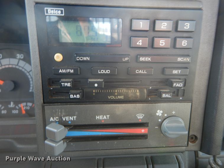 image for item DH2091 1999 GMC C6500 dump flatbed truck with Donkey forklift