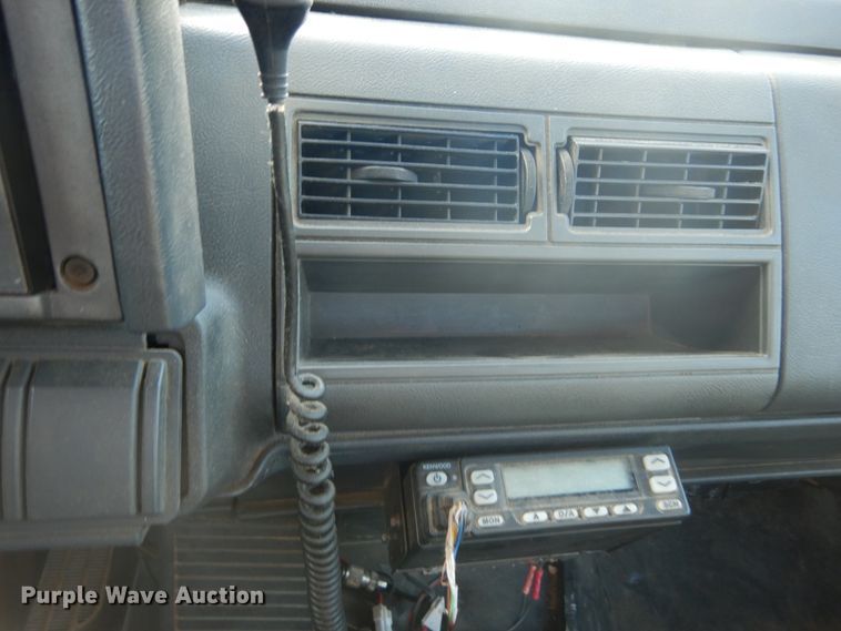 image for item DH2091 1999 GMC C6500 dump flatbed truck with Donkey forklift