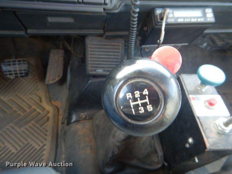 image for item DH2091 1999 GMC C6500 dump flatbed truck with Donkey forklift