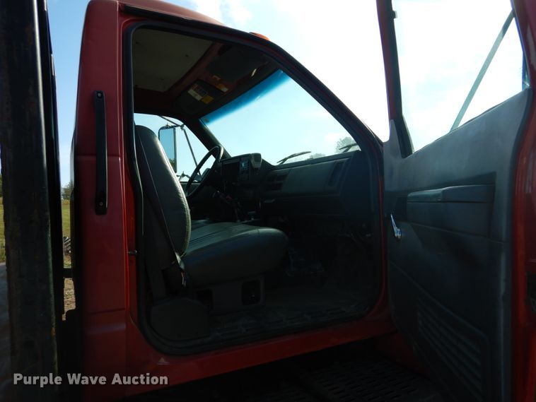 image for item DH2091 1999 GMC C6500 dump flatbed truck with Donkey forklift