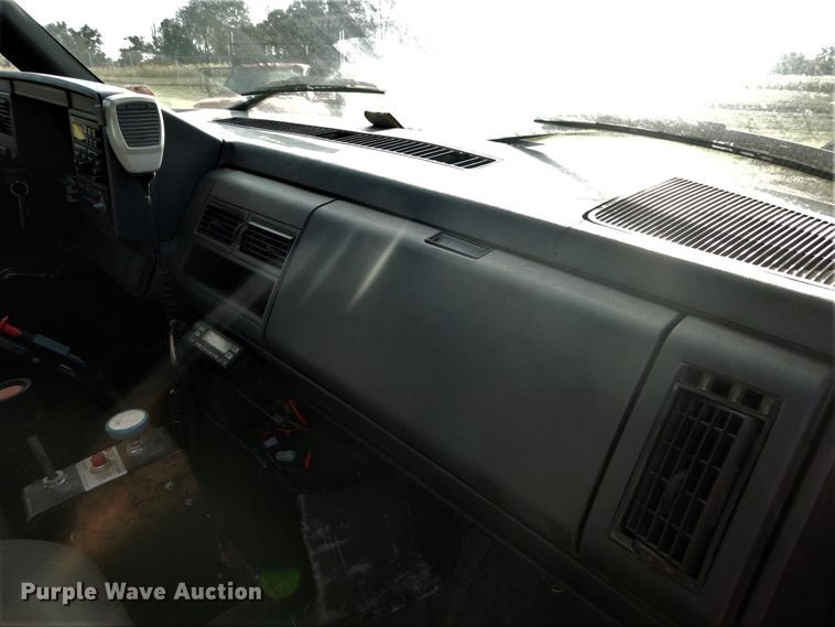 image for item DH2091 1999 GMC C6500 dump flatbed truck with Donkey forklift