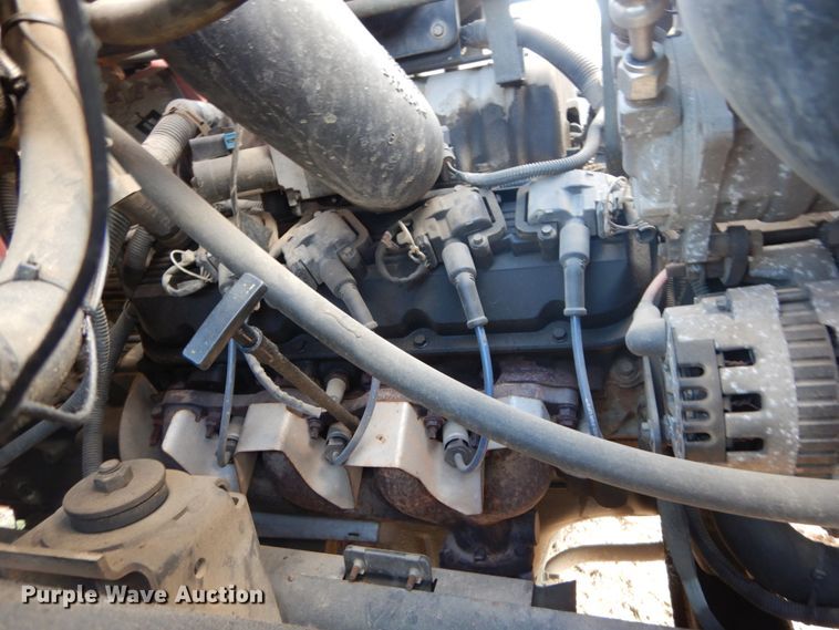 image for item DH2091 1999 GMC C6500 dump flatbed truck with Donkey forklift