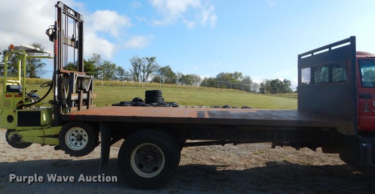 image for item DH2091 1999 GMC C6500 dump flatbed truck with Donkey forklift