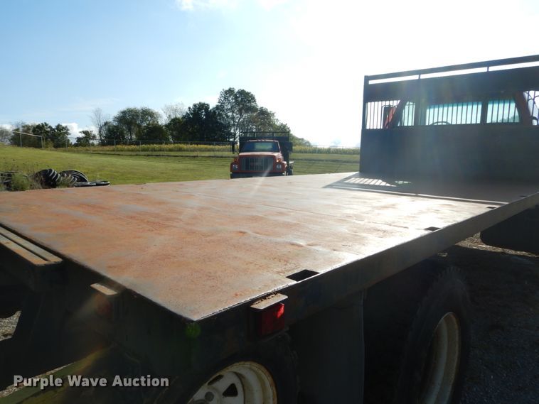 image for item DH2091 1999 GMC C6500 dump flatbed truck with Donkey forklift