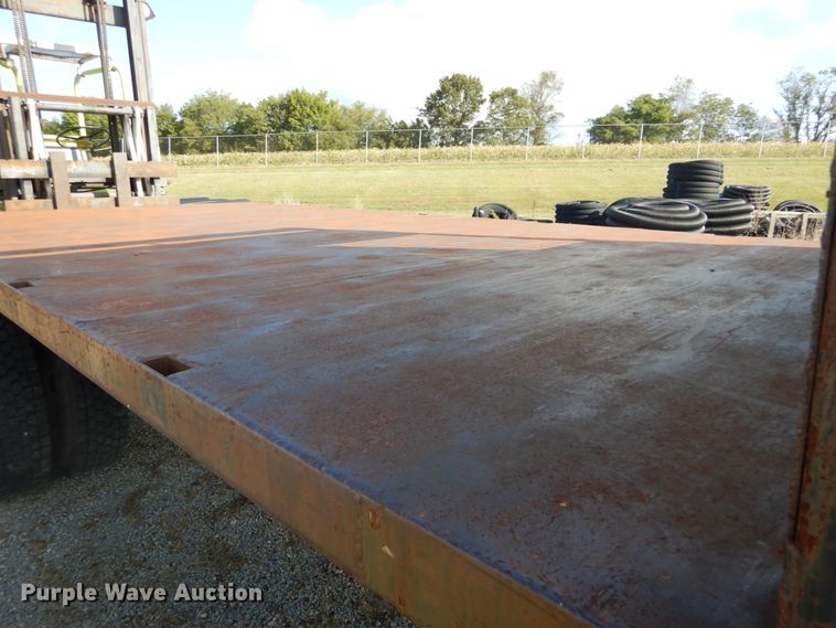 image for item DH2091 1999 GMC C6500 dump flatbed truck with Donkey forklift