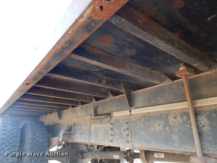 image for item DH2091 1999 GMC C6500 dump flatbed truck with Donkey forklift