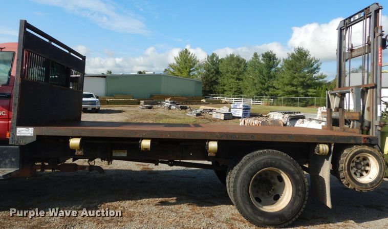 image for item DH2091 1999 GMC C6500 dump flatbed truck with Donkey forklift