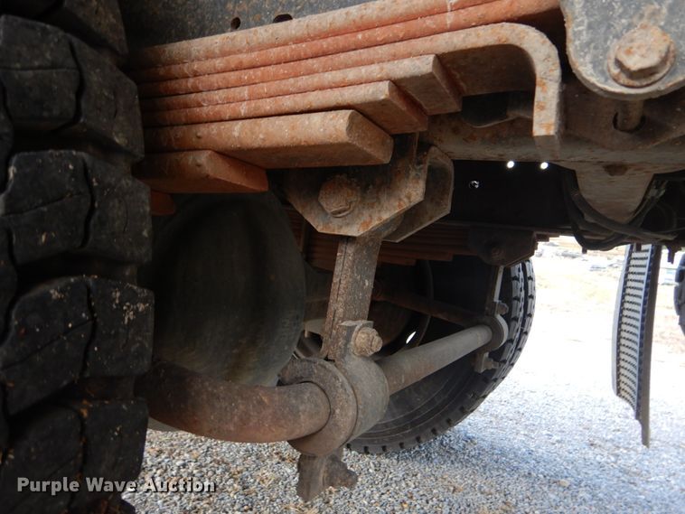 image for item DH2091 1999 GMC C6500 dump flatbed truck with Donkey forklift