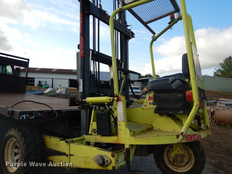 image for item DH2091 1999 GMC C6500 dump flatbed truck with Donkey forklift