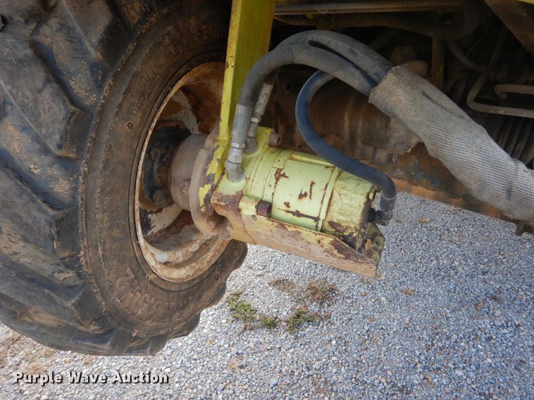 image for item DH2091 1999 GMC C6500 dump flatbed truck with Donkey forklift