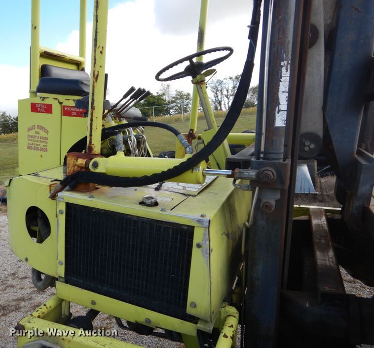 image for item DH2091 1999 GMC C6500 dump flatbed truck with Donkey forklift