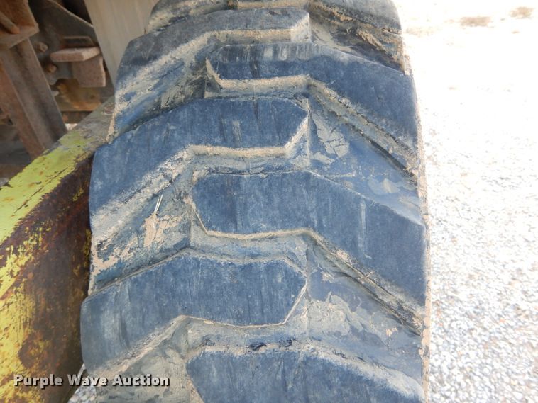 image for item DH2091 1999 GMC C6500 dump flatbed truck with Donkey forklift