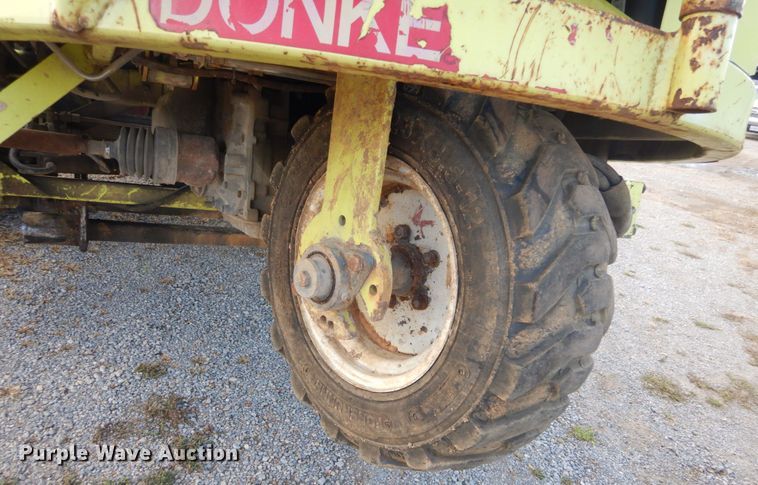 image for item DH2091 1999 GMC C6500 dump flatbed truck with Donkey forklift