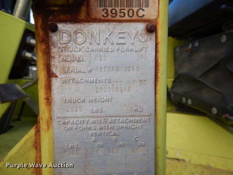 image for item DH2091 1999 GMC C6500 dump flatbed truck with Donkey forklift