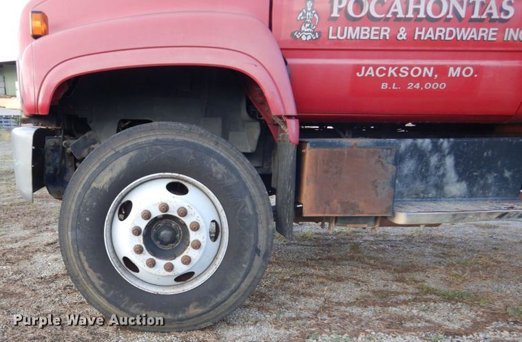 image for item DH2091 1999 GMC C6500 dump flatbed truck with Donkey forklift