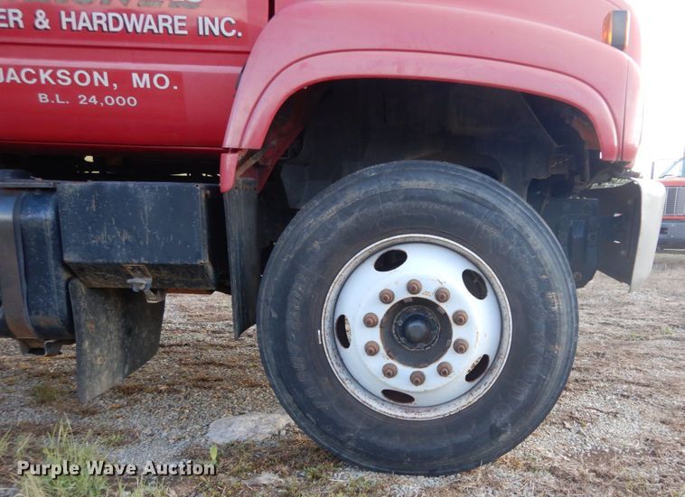 image for item DH2091 1999 GMC C6500 dump flatbed truck with Donkey forklift