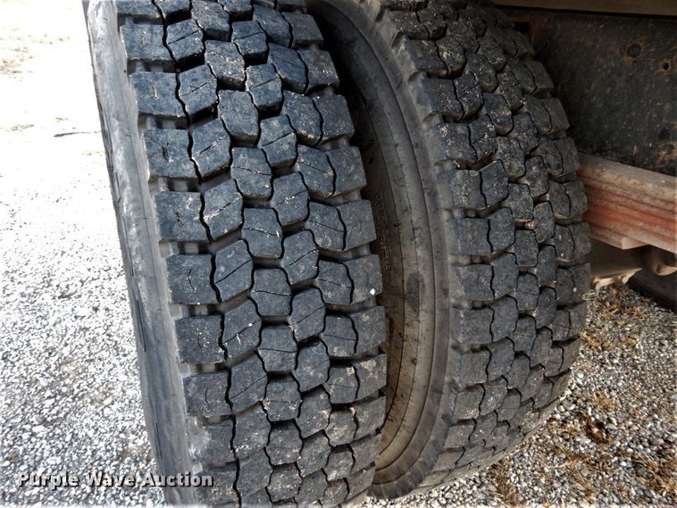 image for item DH2091 1999 GMC C6500 dump flatbed truck with Donkey forklift