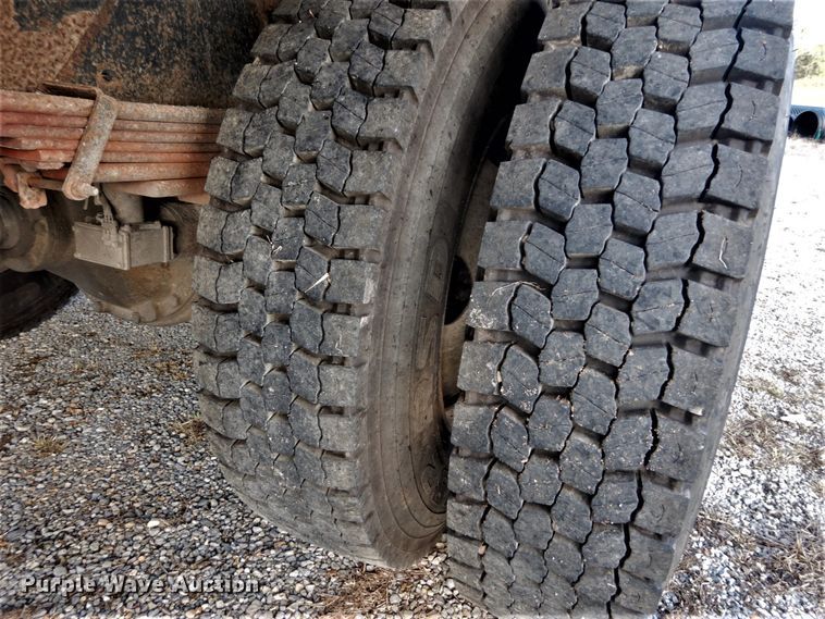 image for item DH2091 1999 GMC C6500 dump flatbed truck with Donkey forklift