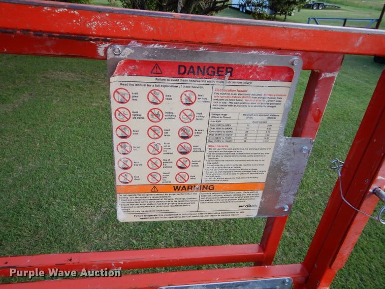 image for item DH3602 Sky Jack SJ6826RT boom lift